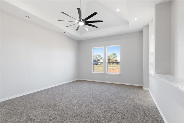 unfurnished living room featuring built in shelves, ceiling fan, and a fireplace