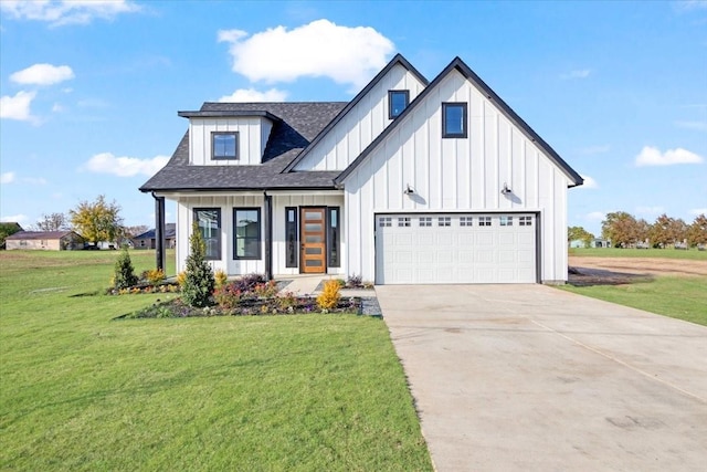 modern farmhouse featuring a front lawn and a garage