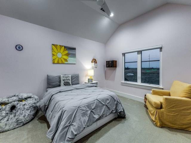 carpeted bedroom with vaulted ceiling