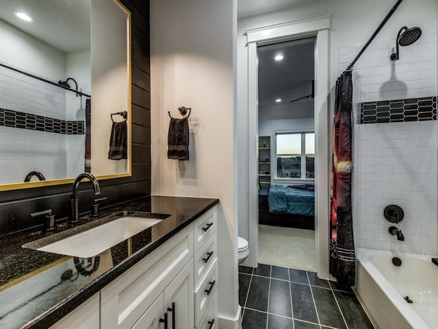 full bathroom with tile patterned flooring, vanity, shower / bath combo, and toilet