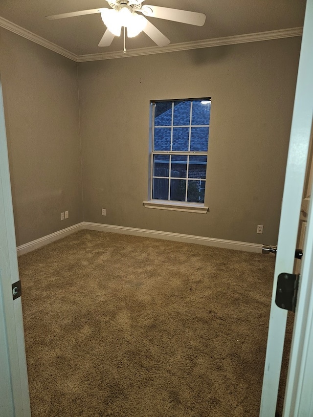 unfurnished room with crown molding, carpet floors, and ceiling fan