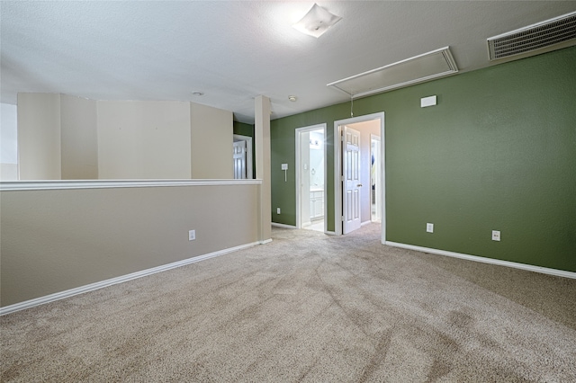 spare room with carpet flooring