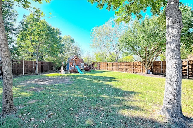 view of yard featuring a playground