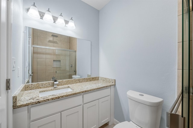 3005 Blackjack Ln, Granbury, TX 76048 - bathroom with toilet, vanity, and a shower stall