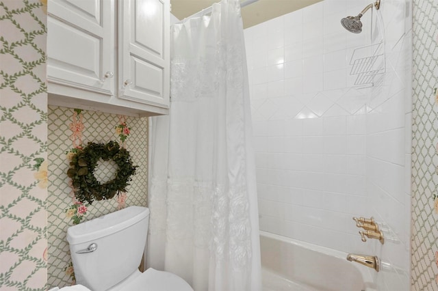 full bathroom featuring shower / tub combo with curtain and toilet