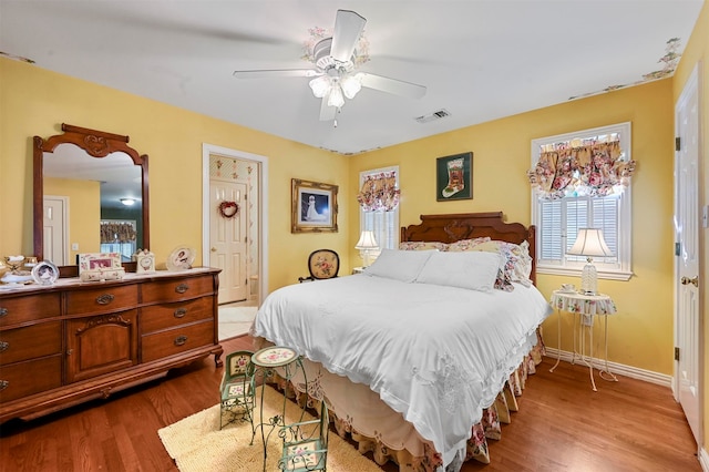 bedroom featuring ceiling fan and light wood-type flooring