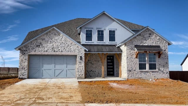 view of front of property with a garage