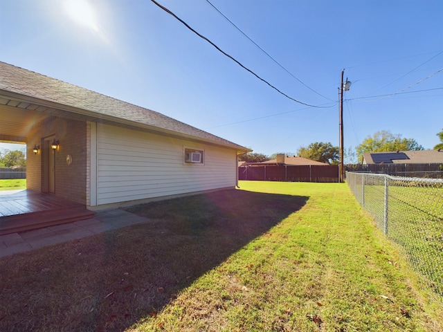 view of yard featuring a wooden deck