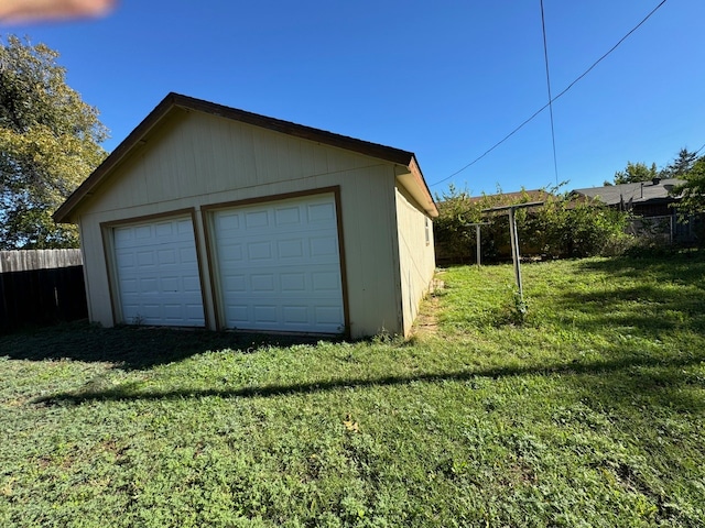 garage with a lawn