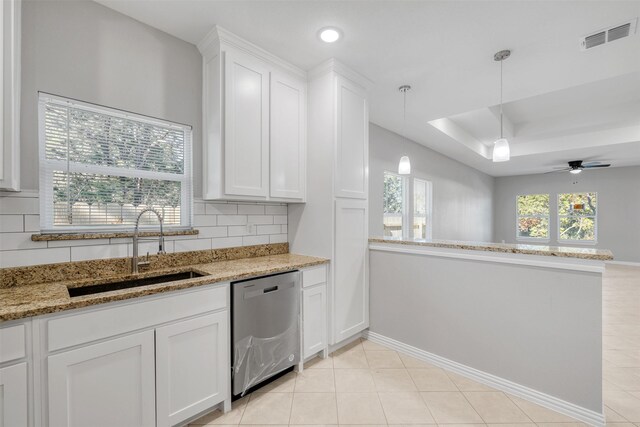 kitchen featuring ceiling fan, sink, pendant lighting, dishwasher, and white cabinetry