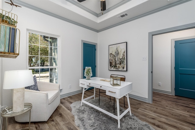 office with ceiling fan, wood-type flooring, and ornamental molding