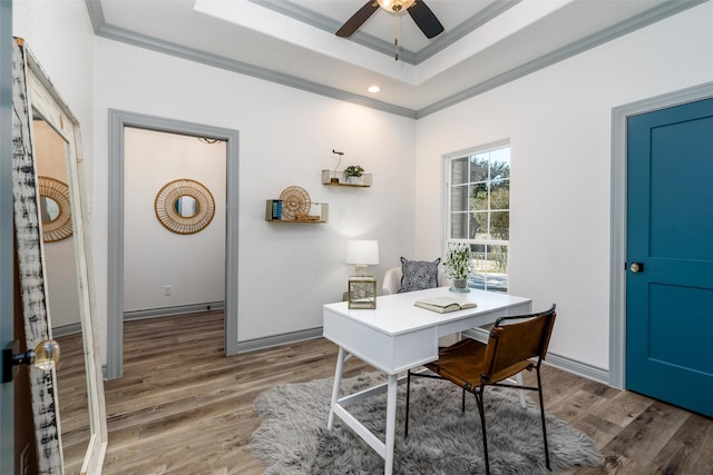 office area with hardwood / wood-style floors, ceiling fan, and ornamental molding