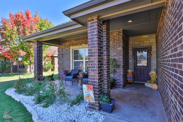 entrance to property with a porch