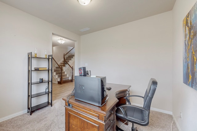 view of carpeted office space