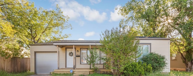 view of front of home with a garage