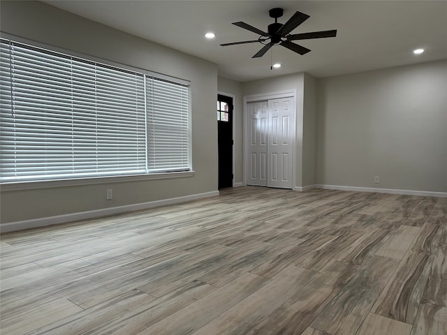 interior space featuring ceiling fan and light hardwood / wood-style floors