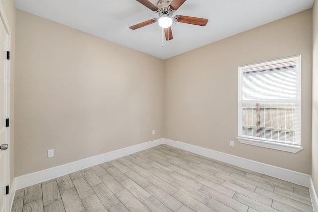 2801 Beechwood St, Granbury, TX 76048 - unfurnished room with light wood finished floors, baseboards, and ceiling fan