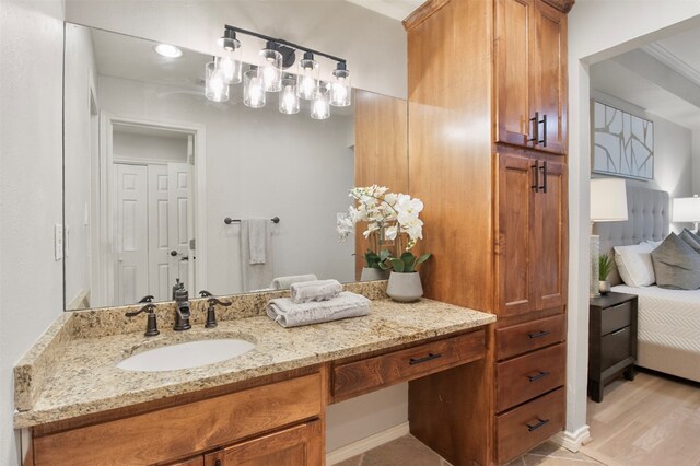 bathroom featuring vanity and hardwood / wood-style flooring