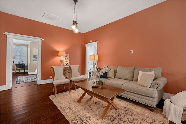 living room featuring dark hardwood / wood-style floors