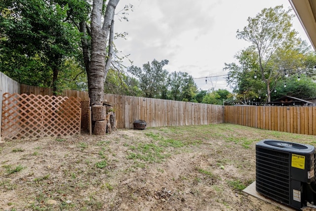 206 Willowbrook Ave, Tyler, TX 75702 - fenced backyard featuring central air condition unit