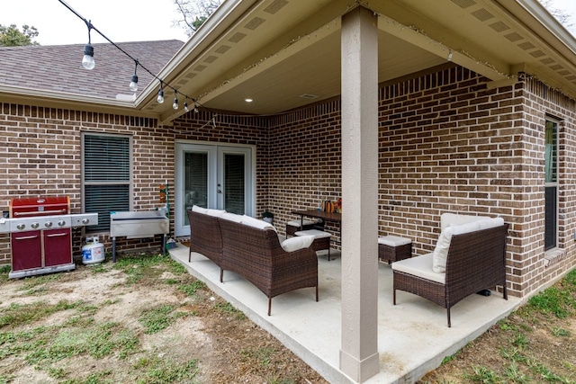 view of patio featuring french doors