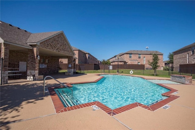 view of pool with a patio area