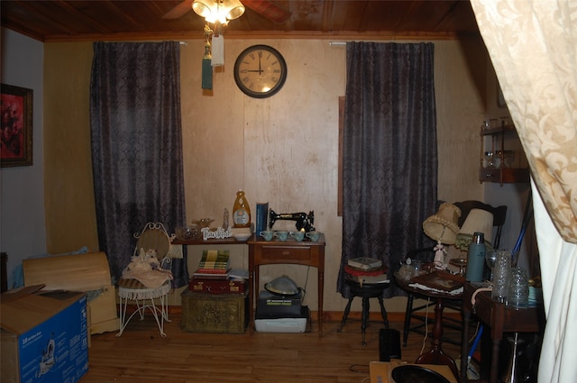 sitting room featuring ceiling fan, hardwood / wood-style floors, and wood ceiling