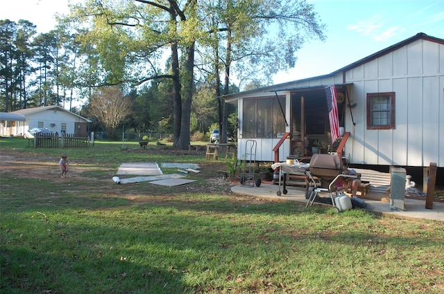 view of storm shelter featuring a yard