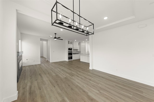 3100 Summer Rain Ln, Anna, TX 75409 - unfurnished living room with recessed lighting, light wood-type flooring, and a ceiling fan