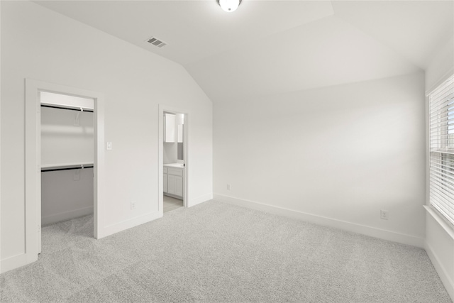 3100 Summer Rain Ln, Anna, TX 75409 - unfurnished bedroom featuring lofted ceiling, light colored carpet, a spacious closet, a closet, and connected bathroom