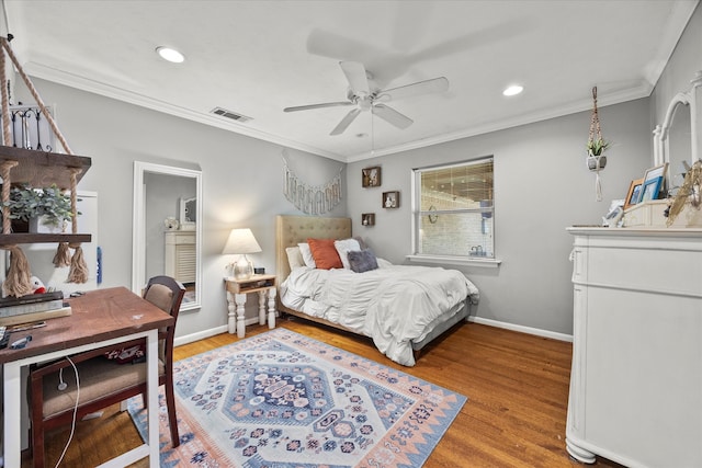 bedroom with ceiling fan, light hardwood / wood-style flooring, and ornamental molding