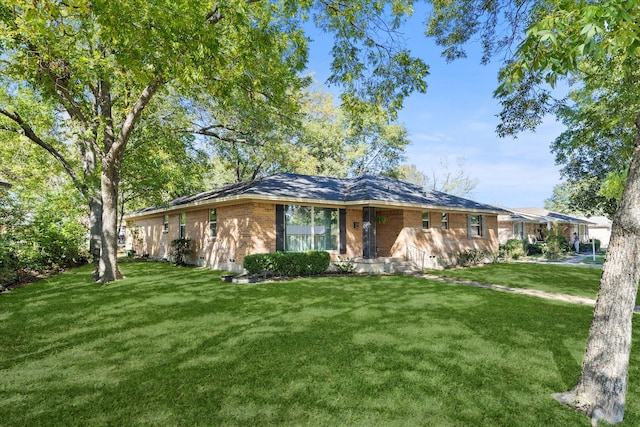 ranch-style home with a front yard