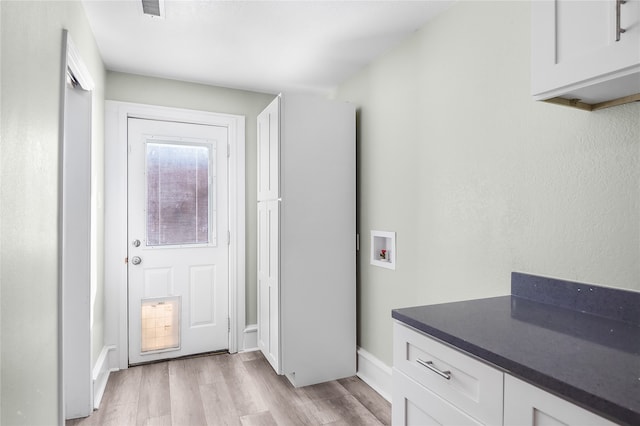 doorway featuring light hardwood / wood-style floors