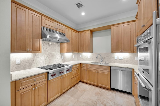 kitchen featuring light stone countertops, sink, backsplash, crown molding, and appliances with stainless steel finishes