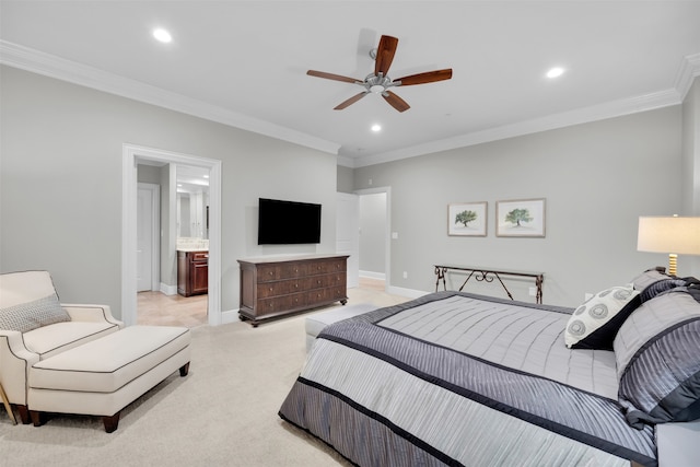 carpeted bedroom with ensuite bath, ceiling fan, and ornamental molding