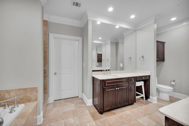 bathroom with tiled bath, crown molding, vanity, and toilet