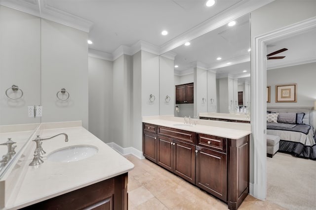 bathroom featuring ceiling fan, tile patterned flooring, vanity, and ornamental molding