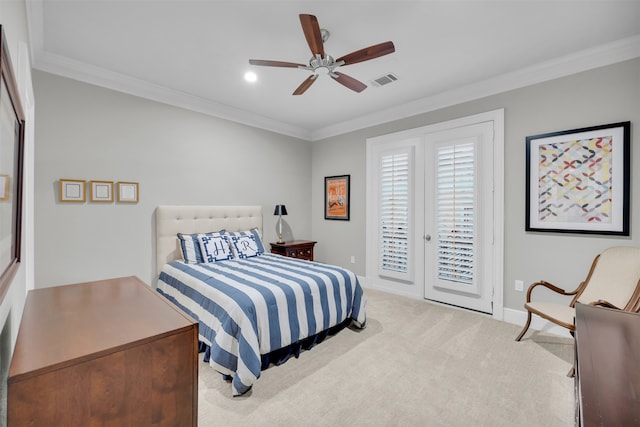 carpeted bedroom featuring access to outside, ceiling fan, crown molding, and french doors