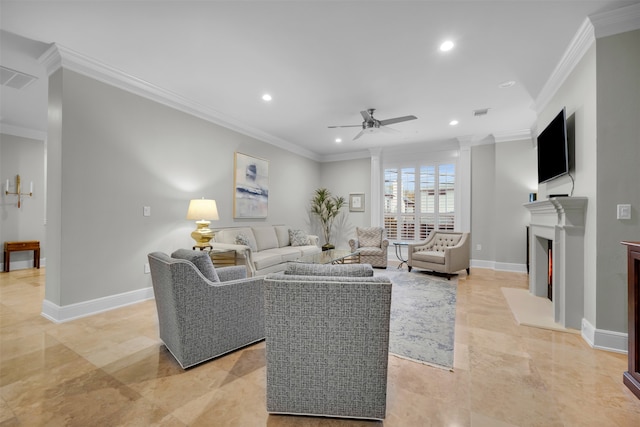 living room with ceiling fan and ornamental molding