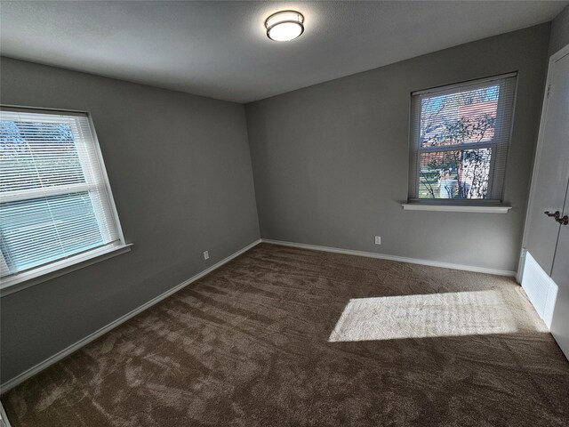 714 Austrian Rd, Grand Prairie, TX 75050 - carpeted empty room featuring baseboards