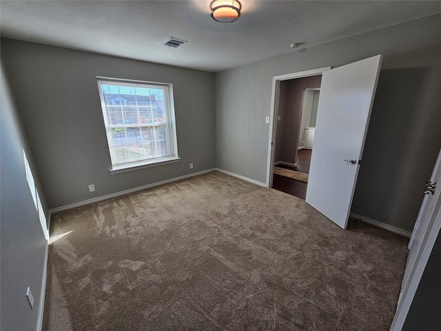 unfurnished bedroom featuring carpet floors