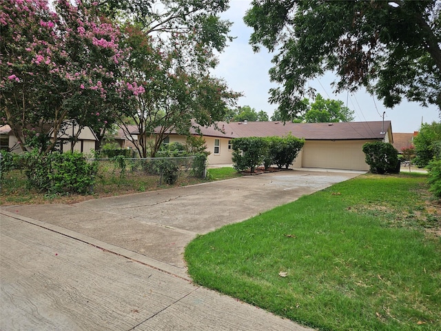 714 Austrian Rd, Grand Prairie, TX 75050 - view of front of property with concrete driveway, a garage, and stucco siding