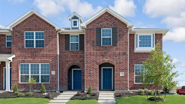 view of front of home with a front yard