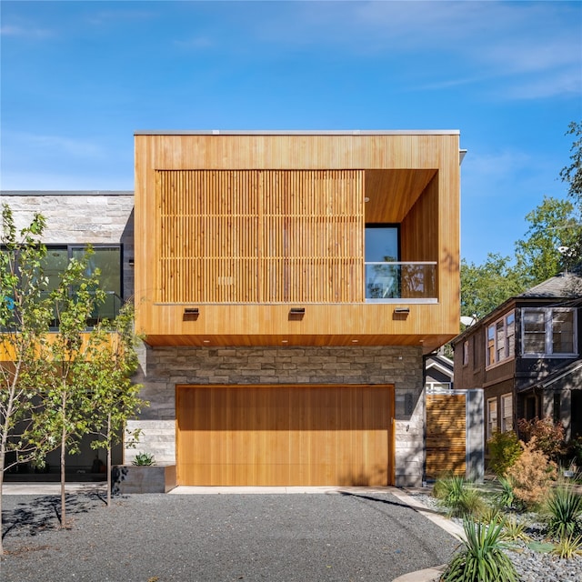 modern home featuring a garage