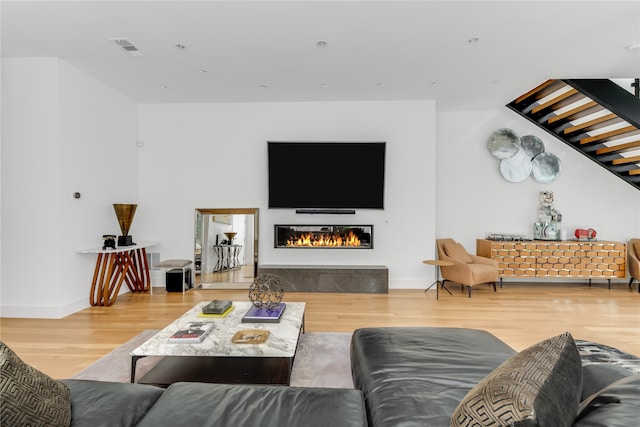 living room with hardwood / wood-style flooring