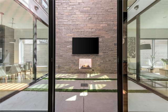 exterior space featuring concrete floors and a wealth of natural light