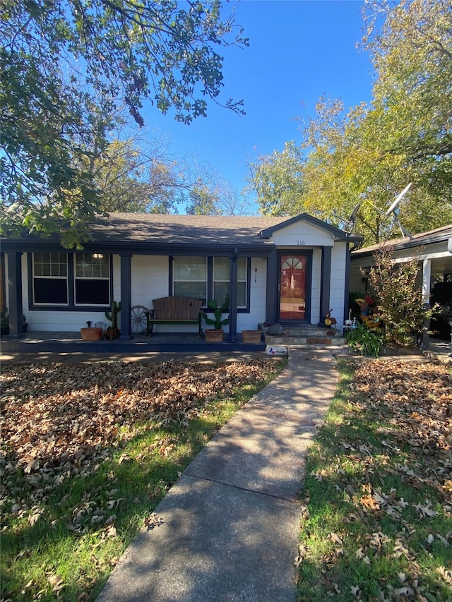 ranch-style house featuring a porch