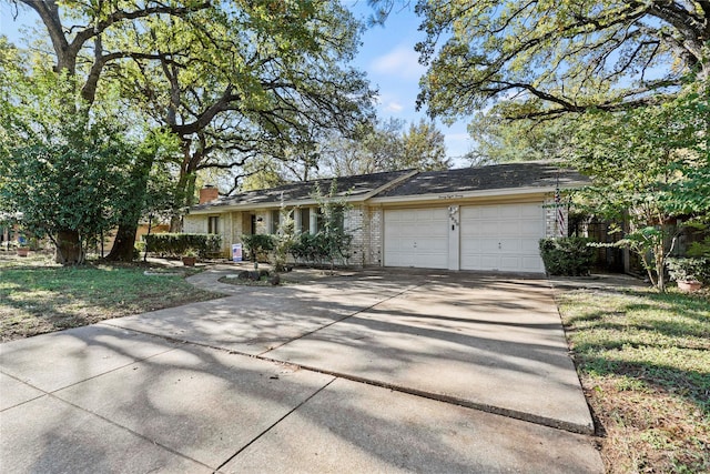 single story home with a garage