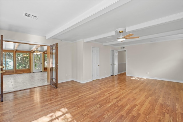 unfurnished room featuring beam ceiling, ceiling fan, and light wood-type flooring