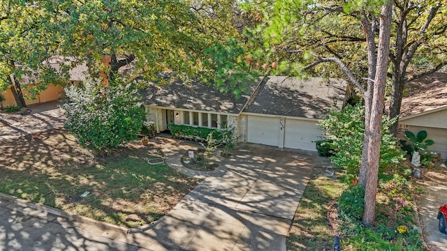 single story home with a garage